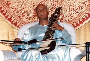 playing_esraj_eyes_closed-small.jpg